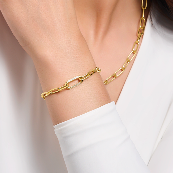 Yellow-gold plated link bracelet with anchor element and zirconia