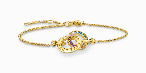 Gold plated bracelet Together with two rings and coloured stones