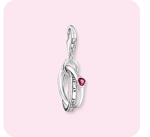 Silver charm pendant with two linked rings and a red stone