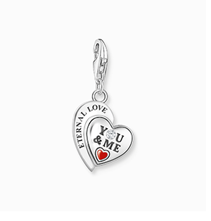 Silver charm pendant in heart-shape with engraving