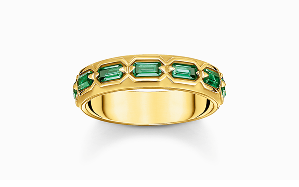 Gold plated ring in crocodile design with green stones