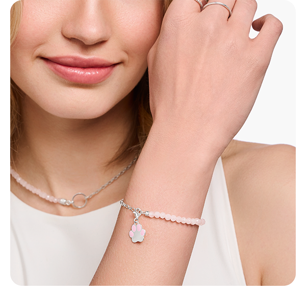 Member Charm bracelet with beads of rose quartz and Charmista Coin silver
