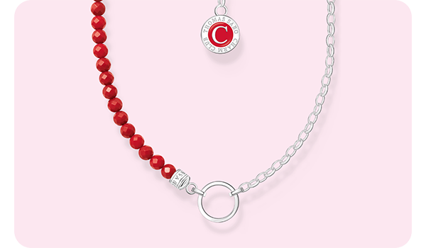 Silver member charm necklace with red beads