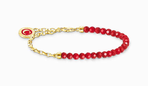 Gold-plated member charm bracelet with red beads 