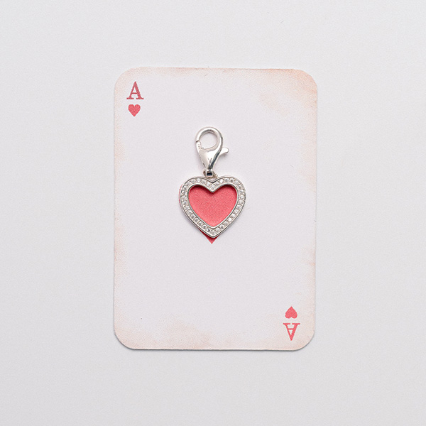 Herz-Charm mit weißen Steinen Silber