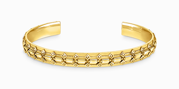 Yellow-gold wide bangle with crocodile detailing