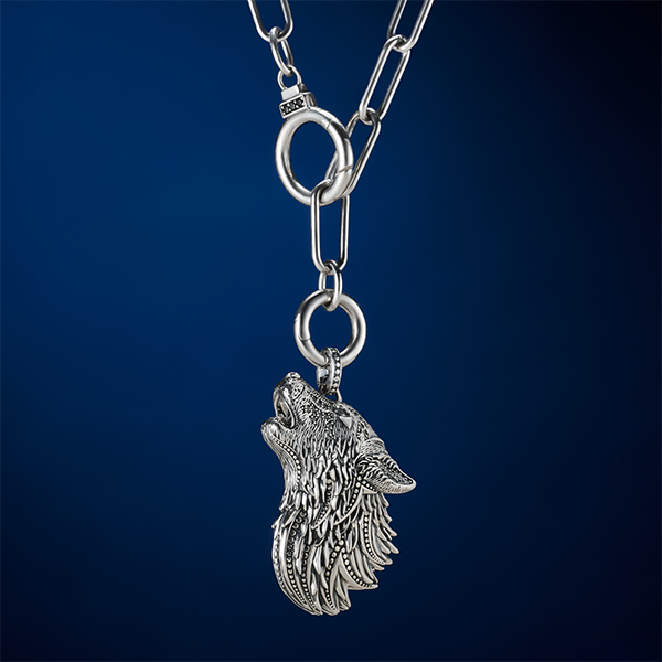 Silver blackened pendant howling wolf with stones