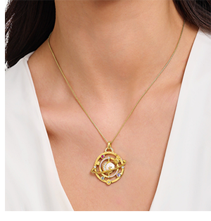 Yellow-gold plated pendant with planetary ring and various stones