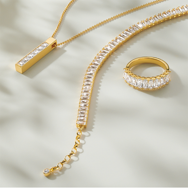 Yellow gold plated jewellery with white stones